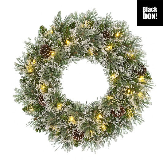 Frosted wreath with battery operated LED and frost